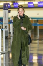 CHRISSY TEIGEN at Los Angeles International Airport 11/06/2017