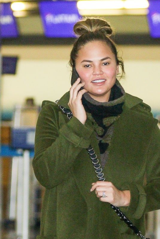 CHRISSY TEIGEN at Los Angeles International Airport 11/06/2017