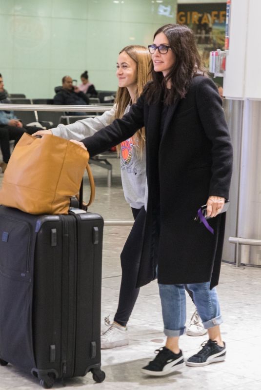 COURTENEY COX at Heathrow Airport in London 11/18/2017