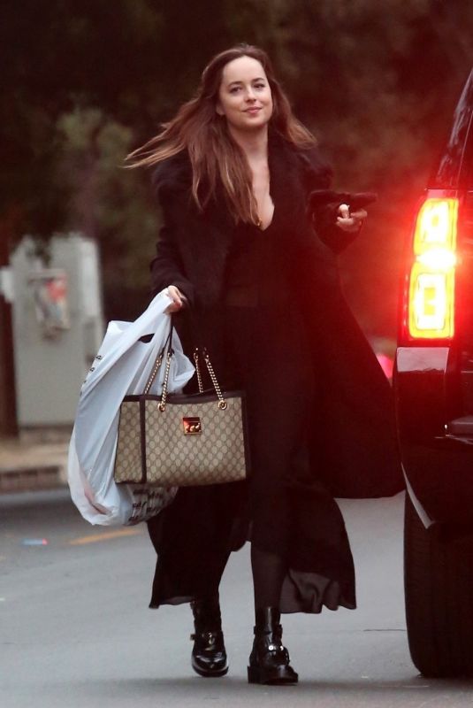 DAKOTA JOHNSON Trick or Treating on Halloween Night in Studio City 10/31/2017
