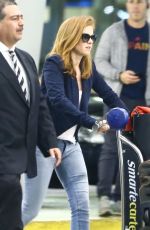 ISLA FISHER Arrives at Airport in Miami 10/31/2017