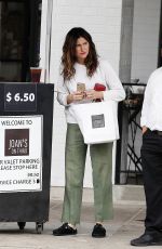 KATHRYN HAHN Leaves Joan