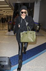 KHLOE KARDASHIAN at LAX Airport in Los Angeles 11/28/2017