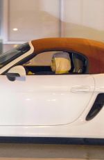 LADY GAGA Drives a White Porsche Convertible Out in Montreal 11/05/2017