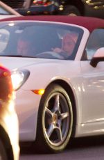 LADY GAGA Drives a White Porsche Convertible Out in Montreal 11/05/2017