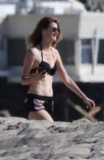 LAURA DERN in Bikini Top and Shorts at a Beach in Malibu 11/22/2017