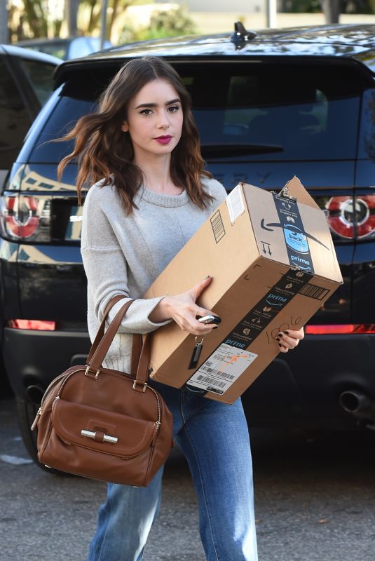 LILY COLLINS Arrives at Fedex in Beverly Hills 11/21/2017