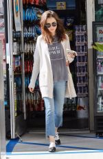 LILY COLLINS at a Gas Station in Los Angeles 11/18/2017