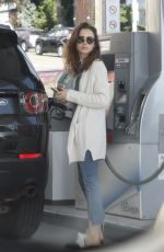 LILY COLLINS at a Gas Station in Los Angeles 11/18/2017