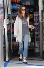 LILY COLLINS at a Gas Station in Los Angeles 11/18/2017