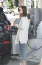 LILY COLLINS at a Gas Station in Los Angeles 11/18/2017