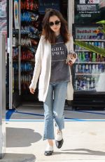 LILY COLLINS at a Gas Station in Los Angeles 11/18/2017