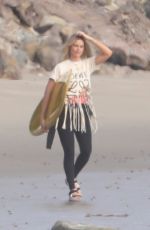 MARGOT ROBBIE on the Set of a Christmas Photoshoot at a Beach in Malibu 11/08/2017