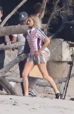 MARGOT ROBBIE on the Set of a Christmas Photoshoot at a Beach in Malibu 11/08/2017