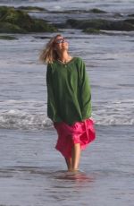 MARGOT ROBBIE on the Set of a Christmas Photoshoot at a Beach in Malibu 11/08/2017