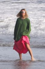 MARGOT ROBBIE on the Set of a Christmas Photoshoot at a Beach in Malibu 11/08/2017
