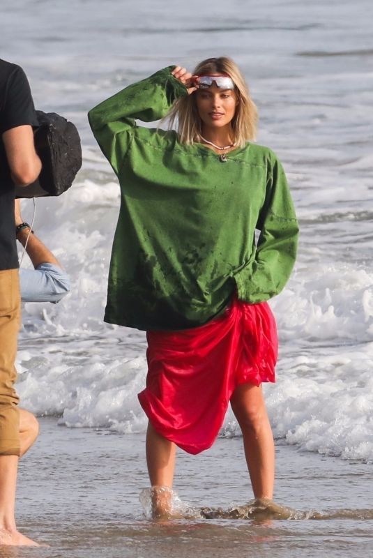 MARGOT ROBBIE on the Set of a Christmas Photoshoot at a Beach in Malibu 11/08/2017