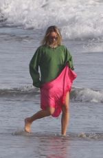 MARGOT ROBBIE on the Set of a Christmas Photoshoot at a Beach in Malibu 11/08/2017