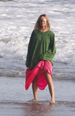 MARGOT ROBBIE on the Set of a Christmas Photoshoot at a Beach in Malibu 11/08/2017