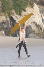 MARGOT ROBBIE on the Set of a Christmas Photoshoot at a Beach in Malibu 11/08/2017