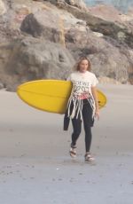 MARGOT ROBBIE on the Set of a Christmas Photoshoot at a Beach in Malibu 11/08/2017