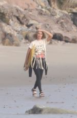 MARGOT ROBBIE on the Set of a Christmas Photoshoot at a Beach in Malibu 11/08/2017