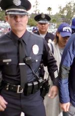 MILA KUNIS and Ashton Kutcher Arrives at Dodger Stadium in Los Angeles 10/31/2017