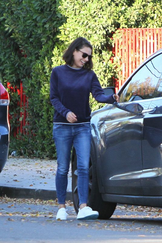 MILA KUNIS Arrives to Her Car in Los Angeles 11/27/2017