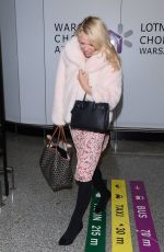 PAMELA ANDERSON at Airport in Warsaw 11/24/2017