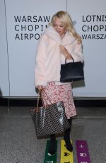 PAMELA ANDERSON at Airport in Warsaw 11/24/2017
