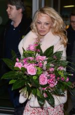 PAMELA ANDERSON at Airport in Warsaw 11/24/2017