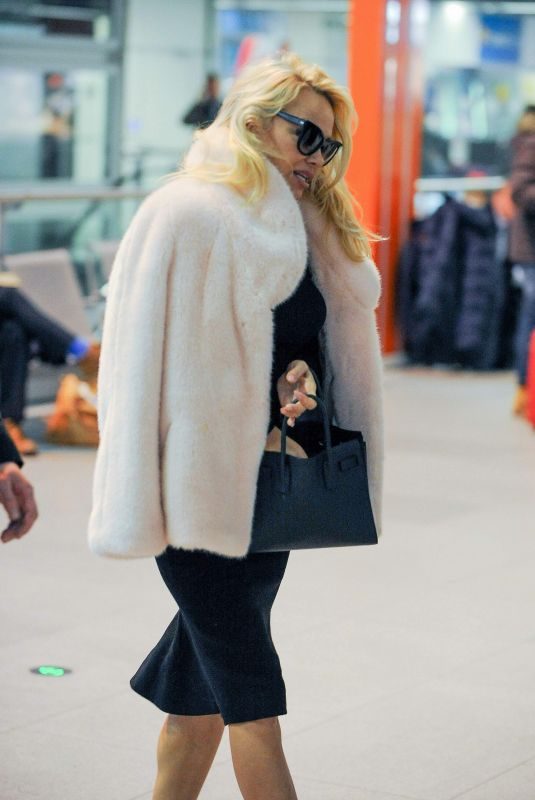PAMELA ANDERSON at Chopin Airport in Warsaw 11/26/2017