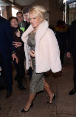 PAMELA ANDERSON Leaves Her Hotel in Warsaw 11/25/2017