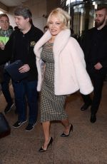 PAMELA ANDERSON Leaves Her Hotel in Warsaw 11/25/2017