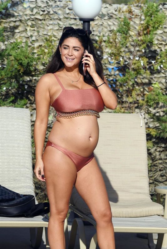 Pregnant CASEY BATCHELOR in Bikini at a Pool in Cyprus 11/27/2017