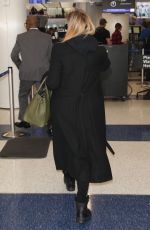 Pregnant KHLOE KARDASHIAN at Los Angeles International Airport 11/15/2017