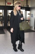 Pregnant KHLOE KARDASHIAN at Los Angeles International Airport 11/15/2017