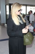 Pregnant KHLOE KARDASHIAN at Los Angeles International Airport 11/15/2017
