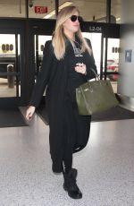 Pregnant KHLOE KARDASHIAN at Los Angeles International Airport 11/15/2017