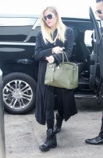 Pregnant KHLOE KARDASHIAN at Los Angeles International Airport 11/15/2017