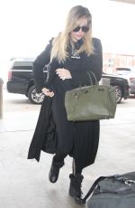 Pregnant KHLOE KARDASHIAN at Los Angeles International Airport 11/15/2017