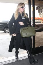 Pregnant KHLOE KARDASHIAN at Los Angeles International Airport 11/15/2017