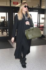 Pregnant KHLOE KARDASHIAN at Los Angeles International Airport 11/15/2017