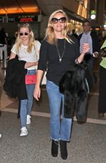 REESE WITHERSPOON and AVA PHILLIPPE at Charles De Gaulle Airport in Paris 11/22/2017