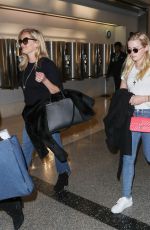 REESE WITHERSPOON and AVA PHILLIPPE at Charles De Gaulle Airport in Paris 11/22/2017