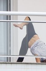 ALESSANDRA AMBROSIO Doing Yoga on Her Balcony in Florianopolis 12/18/2017