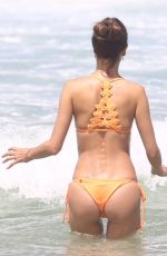 ALESSANDRA AMBROSIO in a Peach Bikini on the Beach in Rio De Janeiro 12/31/2017