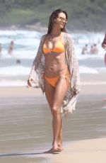 ALESSANDRA AMBROSIO in a Peach Bikini on the Beach in Rio De Janeiro 12/31/2017