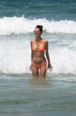 ALESSANDRA AMBROSIO in a Peach Bikini on the Beach in Rio De Janeiro 12/31/2017