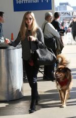 AMANDA SEYFRIED and Her Dog at LAX Airport in Los Angeles 11/27/2017